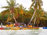 Dugout canoes ferry passengers between Ste. Marie and Île aux Nattes.