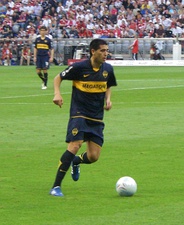 Two moments of Riquelme during his second tenure on Boca Juniors, (left): in the 2009 Audi Cup; (right): in a friendly v RCD Espanyol in 2011