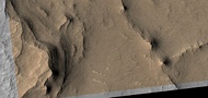 Close view of layers, as seen by HiRISE under HiWish program. Part of the image is in color. HiRISE images only show a middle part in color.