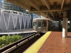 Metrorail (top) and Metromover are elevated modes of public transportation in Downtown Miami.