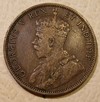 A 1911 penny featuring King George V (No "Dei gratia" on obverse).