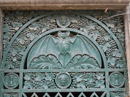 A painted cast iron decorative grate (l) and cast iron cooking skillet (r)