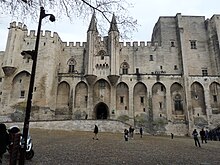 Palais des Papes in Avignon, France (left) and Palazzo Vecchio in Florence, Italy (right) are two examples of medieval palaces.