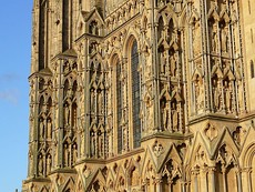 The 13th-century west front by Thomas Norreys. As a synthesis of form, architectural decoration and figurative sculpture it is considered to be unsurpassed in Britain.[98][10][100][5]