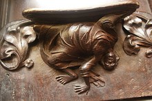 One of several misericords showing heads