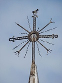 Lithuanian type of cross - saulutė (little sun) containing ancient, pre-Christian motifs.