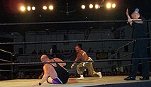 ECW at the venue on June 24, 2006. Clockwise from upper left: Kurt Angle, The Sandman, C. W. Anderson wrestling Sabu.