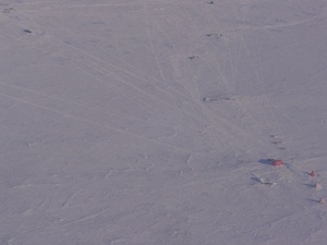 Sky Blu Melon hut and ancillary facilities, taken on approach to the runway. The hut and facilities are located about 1.5 kilometres (0.93 mi) from the runway, pictured top left.