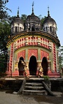 Jayantipur: Pancha ratna Shyamachandrajiu temple with rich terracotta façade, built in 1845. It also has a 17th century laterite built char chala.