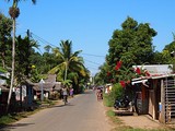 The island's paved road runs up the west coast.