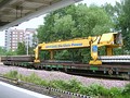 Departmental vehicle for laying railway sleepers