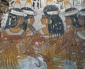 Ancient Egyptian tomb painting depicting players with long-necked lutes, 18th Dynasty (c. 1350 BC).