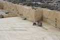 Cutting limestone blocks at a quarry in Gozo, Malta