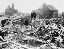 Three Anderson shelters that survived the destruction of the houses adjacent to them following a bombing raid in Norwich