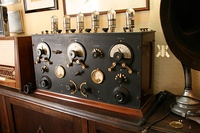 Early 6 tube TRF receiver from around 1920. The 3 large knobs adjust the 3 tuned circuits to tune in stations