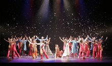 Large group of dancers onstage