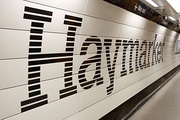 A platform at Haymarket, branded in the new corporate colour scheme.