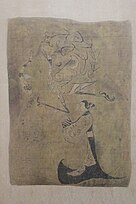 Silk painting depicting a man riding a dragon, 5th century BCE