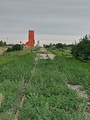 Both of Stoughton's grain elevators alongside the railway