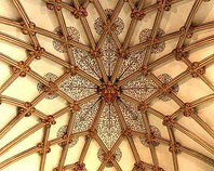 The Lady Chapel was probably designed by Thomas Witney, (1310–19). The windows have tracery of a regular net-like pattern and contain ancient stained glass.