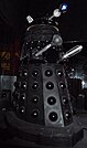 Various Dalek designs from throughout the series, including variants such as the Special Weapons Dalek and the Dalek Emperor.