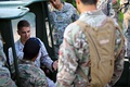 Cpl. Erikon C. Rosamond (left) of the US Marines and Royal Bermuda Regiment soldiers at Camp Lejeune in 2013