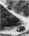 U.S. medium tanks, manned by Chinese and American crews, use the Burma Road for the first time after the combined Allied offensive had broken the two-year Japanese control of the only overland supply route to China., ca. 1945.