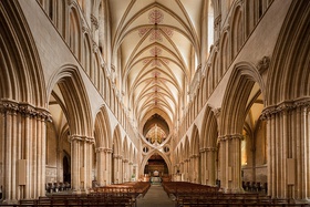 The horizontal line of the nave is emphasised by the unbroken galleries.