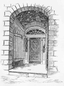 Black and white drawing of an engraved door recessed several feet into a stone archway