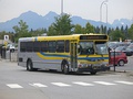 A regular-length high-floor commuter bus