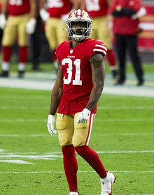 Raheem Mostert in a San Francisco 49ers uniform and helmet.