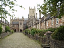 From the Market Place, Penniless Porch (left) leads to Cathedral Green, and The Bishop's Eye (right) to the Bishop's Palace.