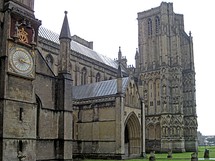 The north transept with its Medieval clock face, the north porch and north-west tower