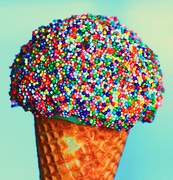 Sugar cone dipped in rainbow sprinkles