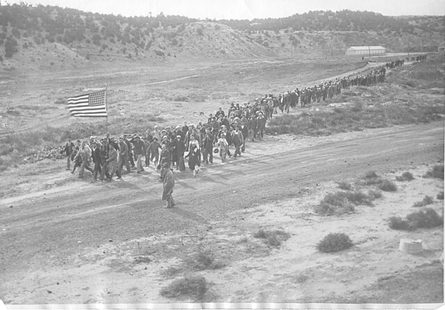 Striking workers and family marching earlier on November 3