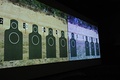 A digital target range at the firearms training simulator on Kunsan Air Base waits to be used.