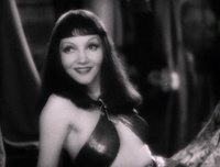 Claudette Colbert as Cleopatra