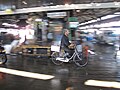 Motion blur is evident in this photo of a worker at the former Tsukiji fish market in Tokyo.