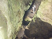 Although the film was shot at a production studio some parts of the film was shot at the real Guna Cave Itself. Interior view (Bottom) and exterior view (Top)