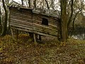 Cabin on stilts near the Uh river branch