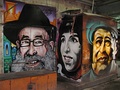 (L. to r.) Rabbi Shlomo ben David Lakein, Naomi Shemer, and local storeowner