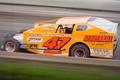 A modern Super DIRTcar Series modified in action