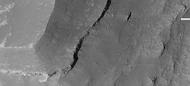 Edge of mesa on floor of Noctis Labyrinthus showing layers; enlargement from the same image as previous.