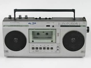 Top: East German Kombinat Sternradio [de] 1980s Cassette SKR 700 boomboxBottom: Sony CD and cassette CFD-S350 boombox released in 2010