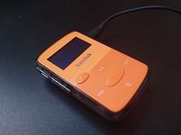 Two flash memory type pocket-size PMPs: Sony's Walkman A810 and Apple's iPod Nano (late 2000s)