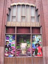 Main entrance, showing the bronze doors beneath the bronze lintel. At the top is a glazed window with diagonal muntins