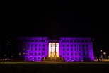 To mark the start of the platinum jubilee year, buildings across Australia were lit in royal purple. Left to right: the High Court of Australia, the John Gorton Building, the National Library of Australia, the National Portrait Gallery, and the National Carillon.