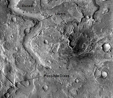 Huo Hsing Vallis in Syrtis Major, as seen by THEMIS. Straight ridges may be dikes in which liquid rock once flowed.