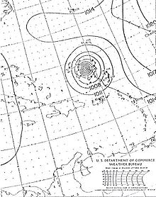 A drawn weather map of Hurricane Dog. The storm is depicted to be north of Puerto Rico. The eastern tip of North Carolina is seen in the top-left portion of the map.