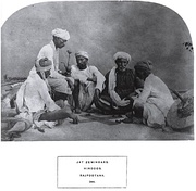 Ethnographic photograph of Jat zemindars (land owners) in Rajasthan, playing pachisi, 1874.